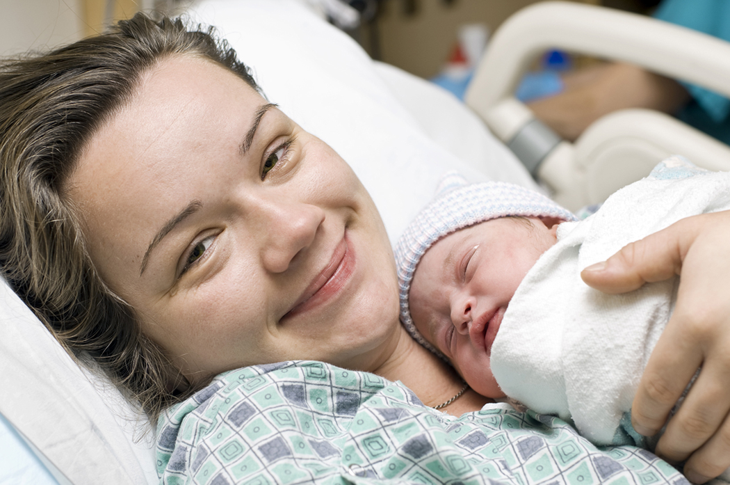 Mother holding her baby