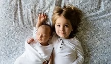 Young children resting together