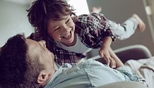 Parent playing with a child
